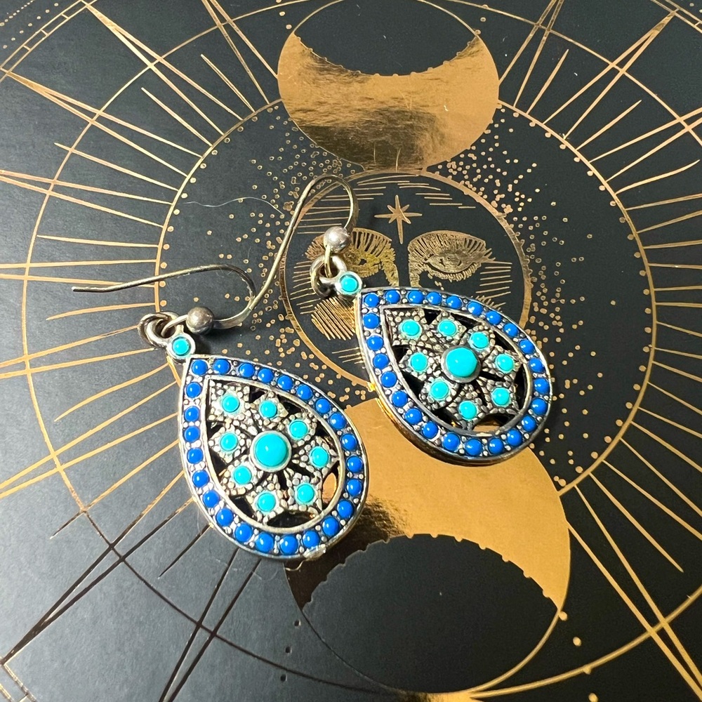 Handcrafted blue and turquoise fish hook dangling earrings.
